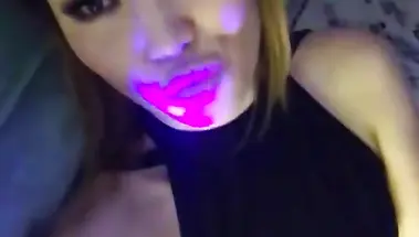 Казахская фифа эротично облизывает губы и гладит сиськи в платье